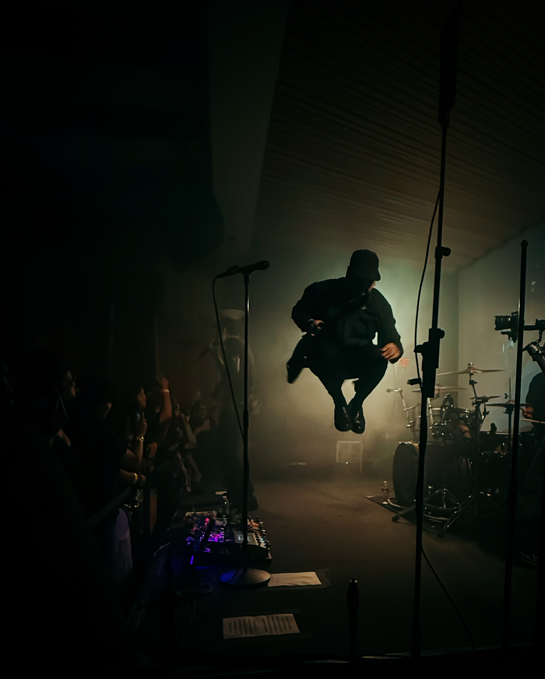 Performer mid-jump on stage